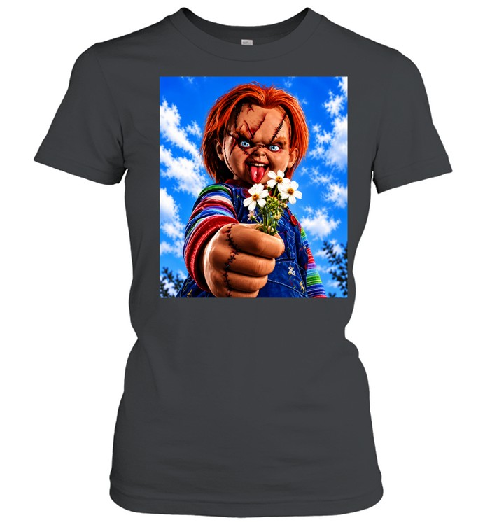 Chucky Child’s Play character holding flowers against blue sky Women T-Shirt